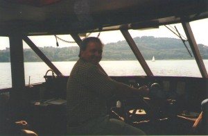 kona-winds-author Setember 2002, the author at the wheel on the way back from Indian Arm, Vancouver, B.C., author collection