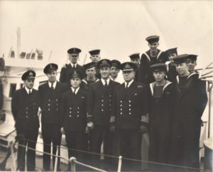 Oct. 14-1944. Crew of Q065 with Captain (ML) Joseph Heenan Crew signatures on reverse with wishes